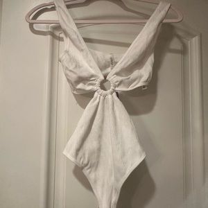NWT women’s white cut out bodysuit